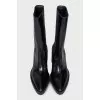 Black pointed-toe boots