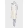 White dress with a pleated skirt