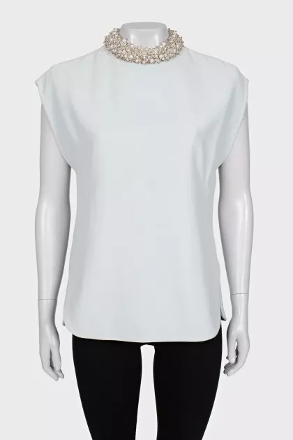 Blue blouse with a decorated collar
