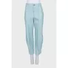 Turquoise leather trousers