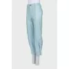 Turquoise leather trousers