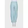 Turquoise leather trousers