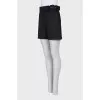 Black shorts with a belt