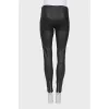Leather leggings with a zipper on the leg