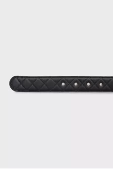 Quilted belt with silver buckle