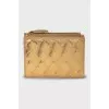 Golden leather wallet
