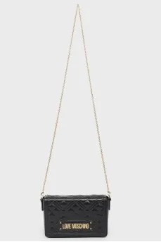 The bag is quilted with strap-chain
