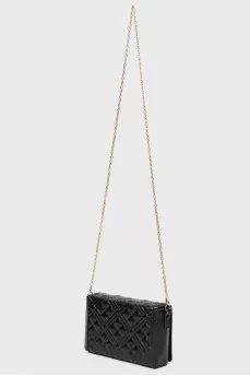 The bag is quilted with strap-chain