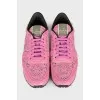 Pink sneakers with laces