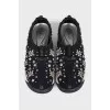 Slip-on sneakers with rhinestones