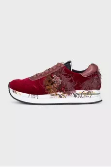 Velvet sneakers with feathers