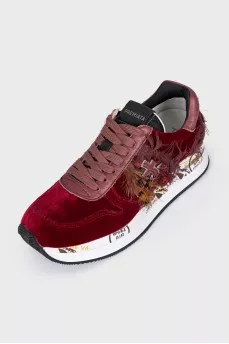 Velvet sneakers with feathers