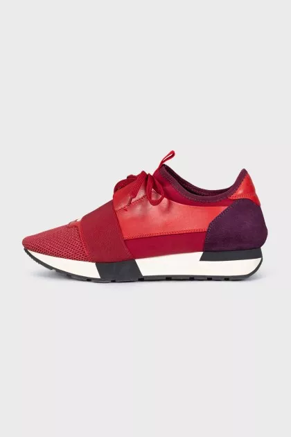 Red sneakers made of textile and leather