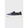 Blue leather slip-ons with decor