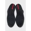 Black sneakers with a ribbed toe