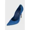 Blue suede pumps with a shaped heel