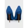 Blue suede pumps with a shaped heel