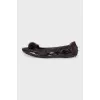 Patent leather ballet flats with pom-poms