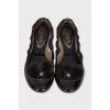Patent leather ballet flats with pom-poms