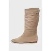 Beige pleated boots