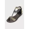 Green leather sandals with decoration