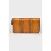 Wallet with an embossed snake pattern