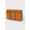 Wallet with an embossed snake pattern