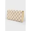 White wallet in a corporate print