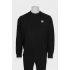 Men's black sweatshirt with a contrasting logo