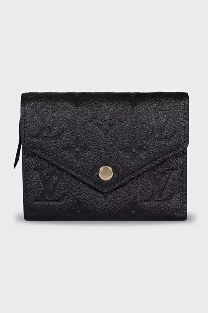 Black wallet with branded embossing