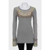 Long sleeve decorated with crystals and beads