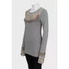 Long sleeve decorated with crystals and beads