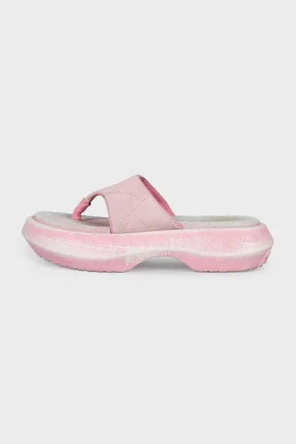 Pink suede flip-flops