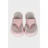 Pink suede flip-flops