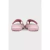 Pink suede flip-flops