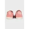 Pink embossed sneakers