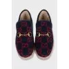 Insulated slip-ons with a signature print