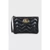 Quilted leather clutch with logo