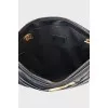 Quilted leather clutch with logo