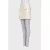 Mini skirt with frill and patch pocket