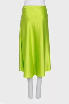 Straight-cut skirt with a shaped slit