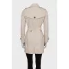 Beige cropped trench coat with belt