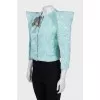 A shimmery jacket with accent shoulders