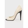 Beige shoes with black heels