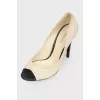 Beige shoes with black heels