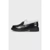 Black loafers with fur