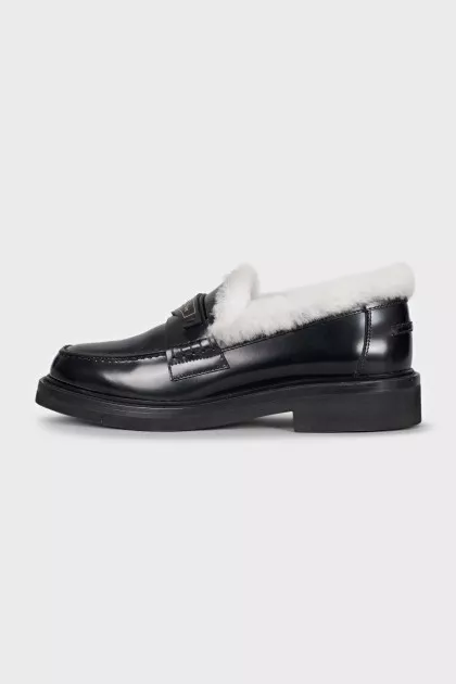 Black loafers with fur