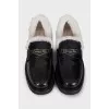 Black loafers with fur