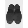 Black loafers with fur