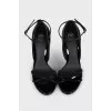Black patent leather heeled sandals